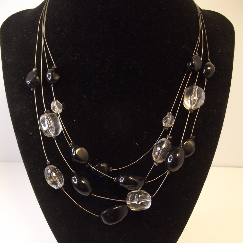 Illusion multi strand necklace black & clear